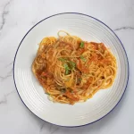 Top down tomato garlic pasta