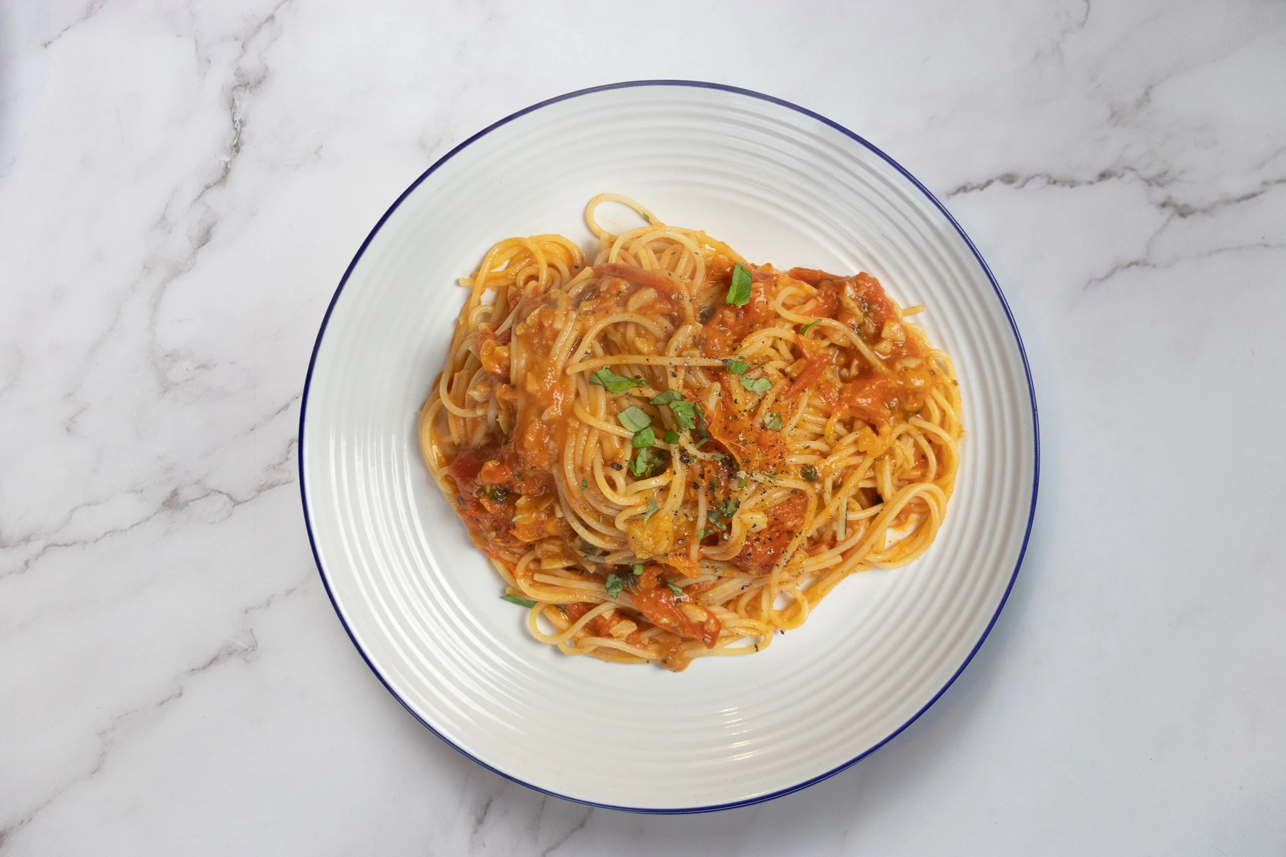 Top down tomato garlic pasta