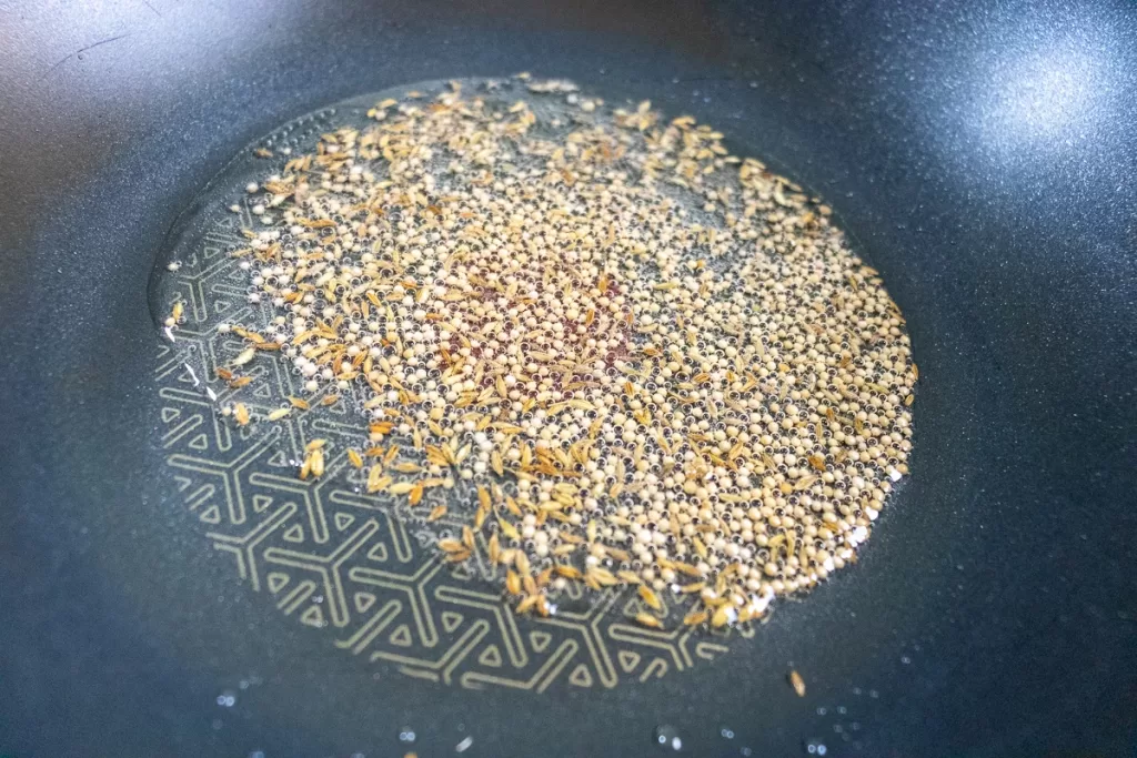 Mustard and cumin seeds frying
