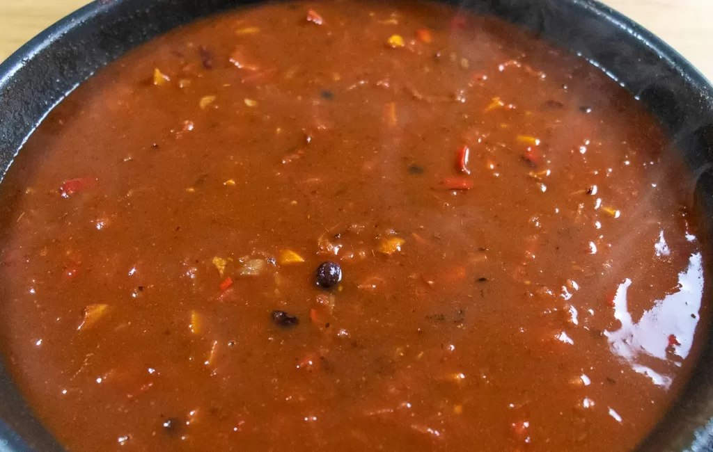 Adding beans and tomatoes mixed