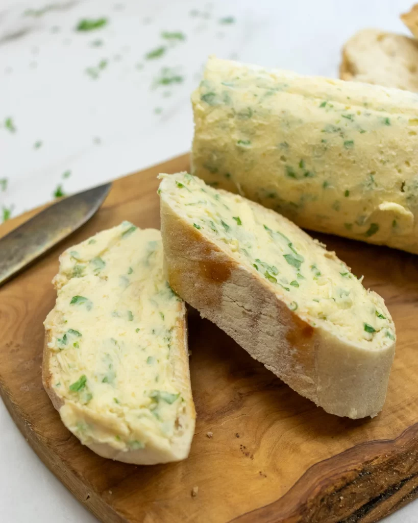 Close vegan garlic butter on bread